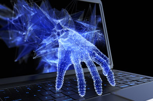 Hand stealing personal data through a laptop