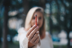 Girl Holding A Joint